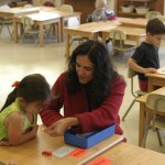 North Class student with teacher Dolores Elkin.