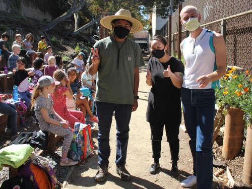 With 2nd Grade Teacher Lisa Ma and Extended Day Instructor Brendan Dunlap ’11, Jalen leads a fi...